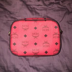 RED MCM PURSE WITH LEATHER STRAP NEVER USED